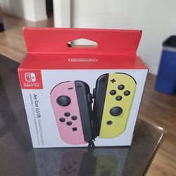 NINTENDO SWITCH NEW COLORS PASTEL PINK AND YELLOW JOY CONS BRAND NEW FACTORY SEALED 