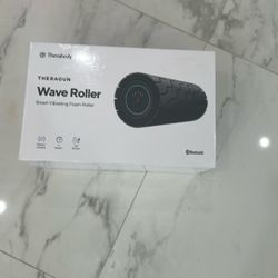 Sealed Christmas Present Wave Roller Theragun