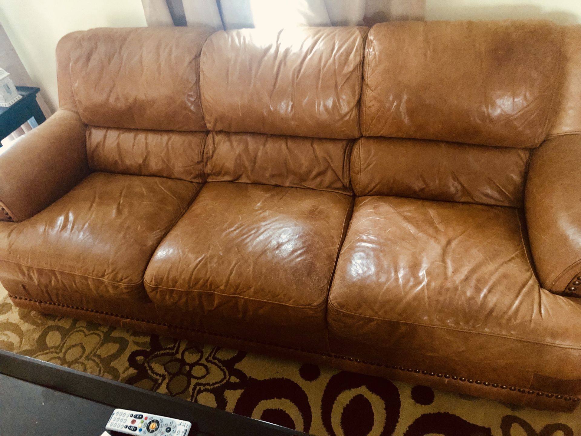 Leather couch $100 obo