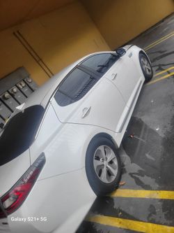 White Sedan – Good Condition