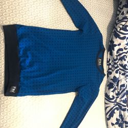 Blue sweater with a star pattern. Like new condition