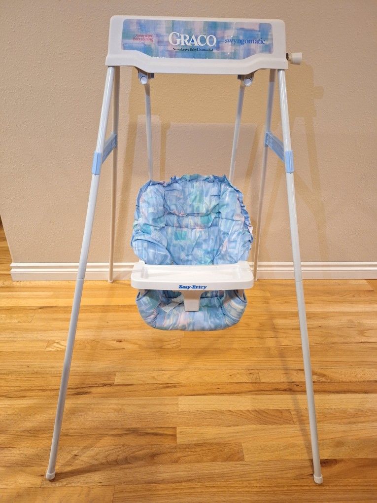 Vintage Graco Swyngomatic wind-up baby swing