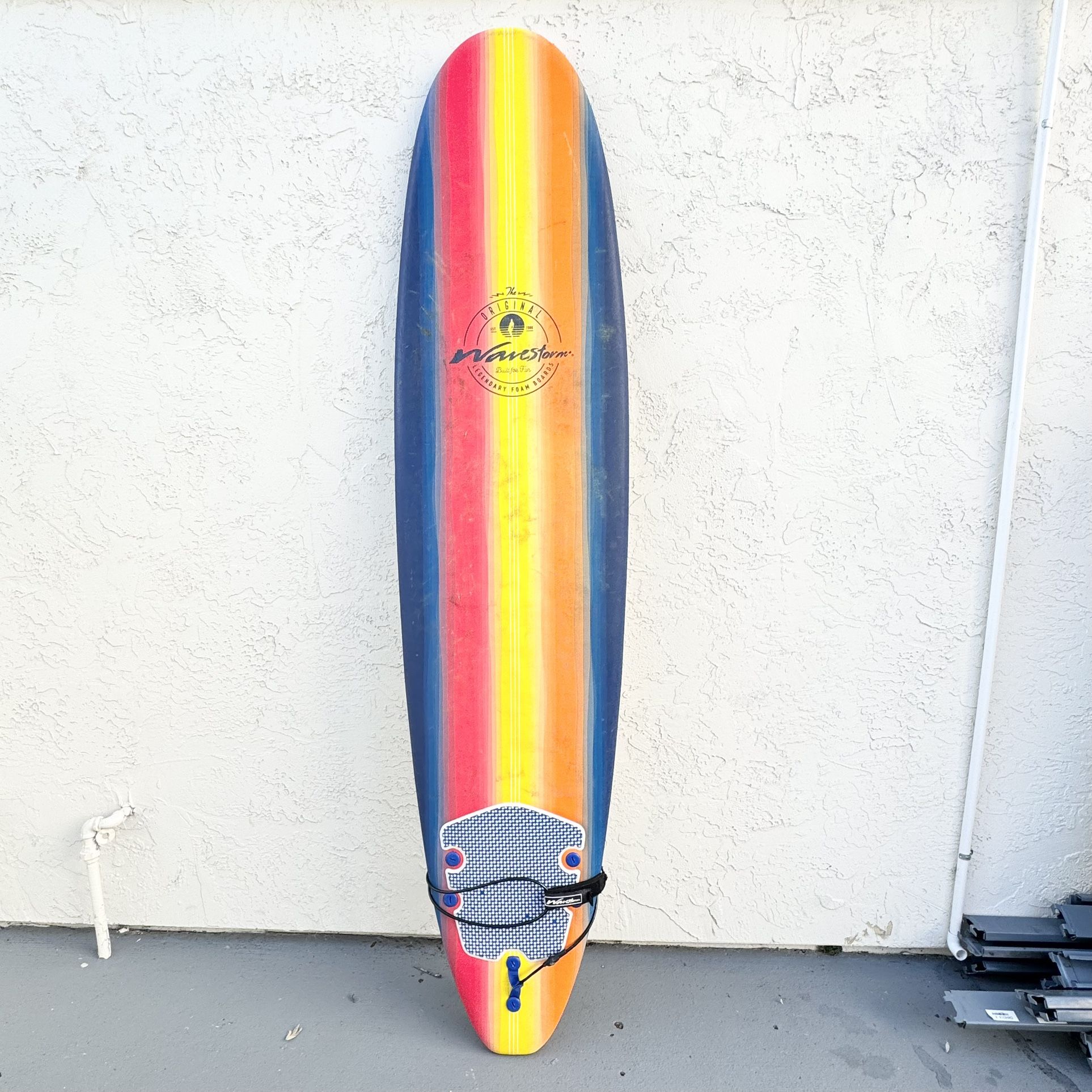 Barely used 8β Wavestorm Beginner Surfboard w/ fins and leash