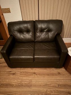 Leather love seat