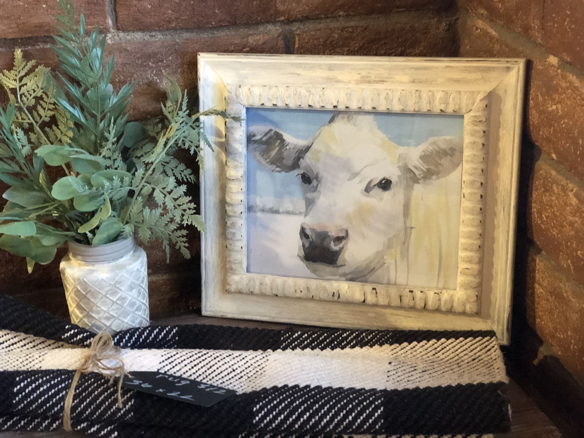 Vintage distressed framed cow decor