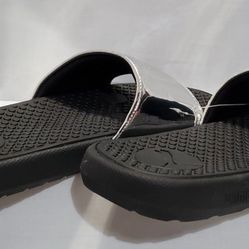 Puma slides/ sandals ( Women Size 6 )