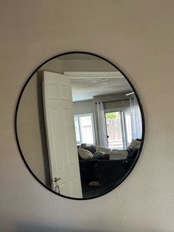 Black round mirror