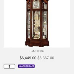 Howard Miller Grandfather Clock And Curio Cabinet 