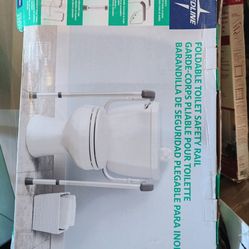 Foldable toilet safety rail