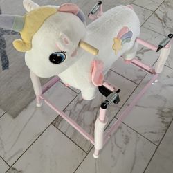 Unicorn bouncy ride-on toy