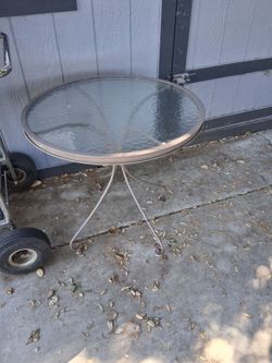 Wrought iron glass table