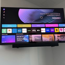 Like new LG 65 Inch TV With Sound Bar 