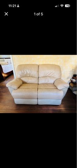 Beige Leather Reclining Loveseat