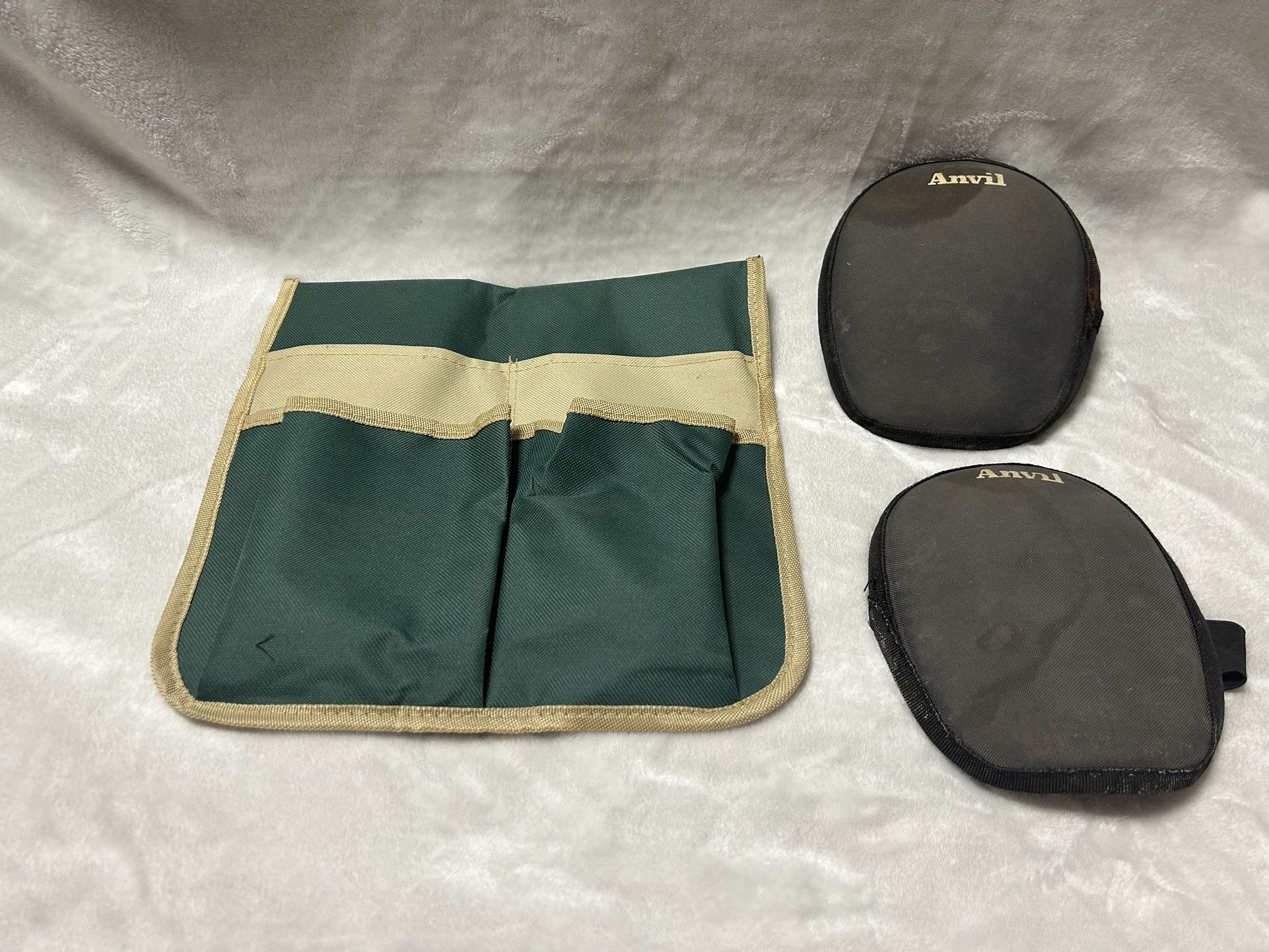 Black knee pads & green garden tool bag