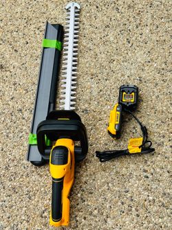 Head trimmer: used with DeWalt battery and charger