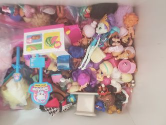 Box full of toys mostly girl lol dolls and such