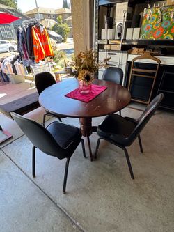 Beautiful drop leaf table with 4- retro chairs all for $65