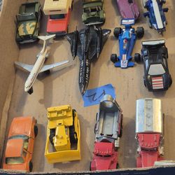 13 vintage matchbox and hot wheels, cars and trucks