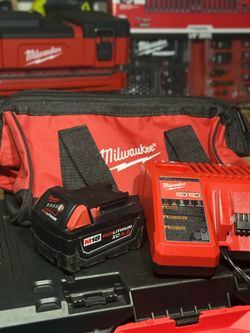Milwaukee M18 18-Volt 4.0 Ah Lithium-lon XC Extended Capacity Battery Pack with Charger and tool bag
