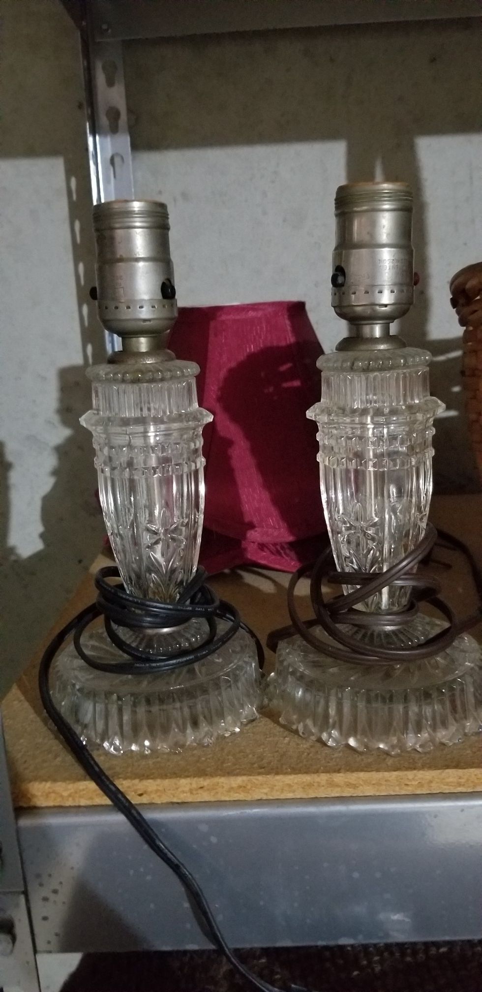 Two small antique vanity lamps.