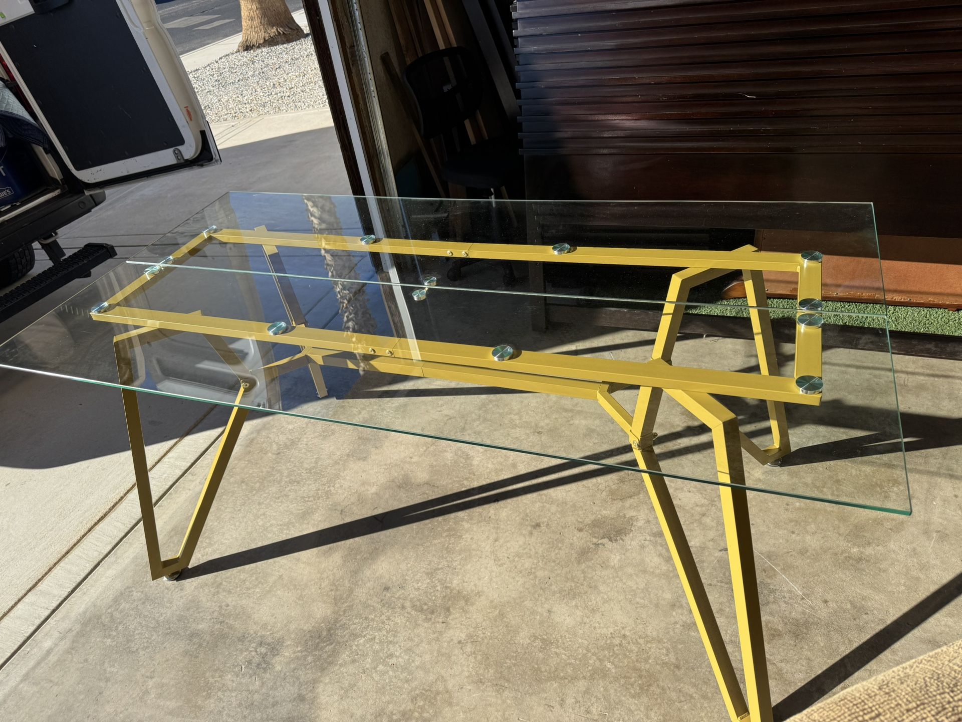 brand new glass and metal ,glass table  $80 round dining table table leave six chairs $350 coffee table $35