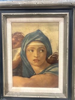 framed print of Michelangelo's Delphic Sibyl, a famous fresco from the Sistine Chapel ceiling.