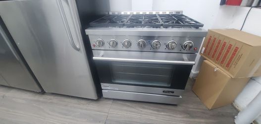 Stove Gas 36 inch new 1 year manucfature  warranty  6 burner  stainless convention Broil 301 Saundview Ave Bronx NY 10473