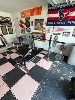 Workout bench with weights and bar