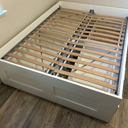 Ikea full  size bed frame  with dual side drawers . used for about a year in great shape 