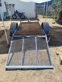 Utility trailer with ramp$300 no less no more serious buyers only