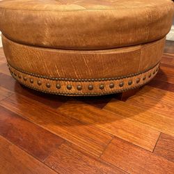 Leather beautiful ottoman  In great condition  40 by 17 hight
