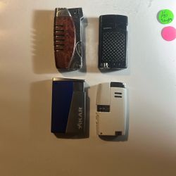 this Is A Lot Of  4 Cigar Lighters From Xikar