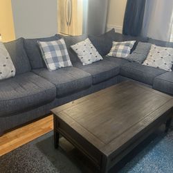 Used Couches ,75 Inches Of Television Set, and  a Center Table 