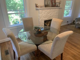 4 chairs and dining table from Bombay and Company.