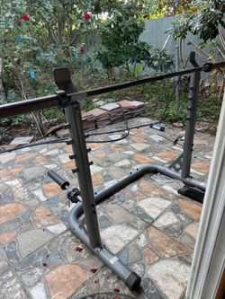 Squat rack and Olympic bar 60lbs one piece