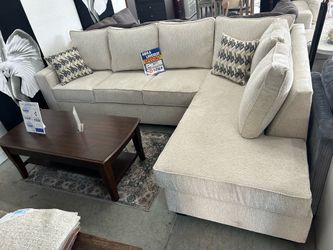 Custom sectional sofa available in different colors , fabric and sizes