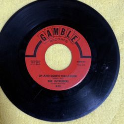 1966 7-inch 45 RPM vinyl record by The Intruders on the Gamble Records label.  Artist: The Intruders Label: Gamble Records (G-201) A-Side Song: "Up an
