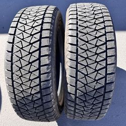 Pair (2) 235 65 18 Bridgestone Blizzak DM-V2 winter tires