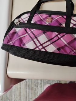 It's A Cute Little Pink Bag With Black Trim