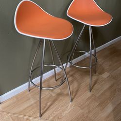 Pair Orange Bar Stool with Chrome Base 16”W x 14” D x 37”H