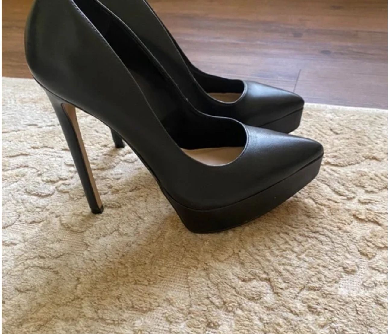 Although platform black high heels Size 7.5
