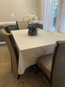 Table And 4 Chairs .