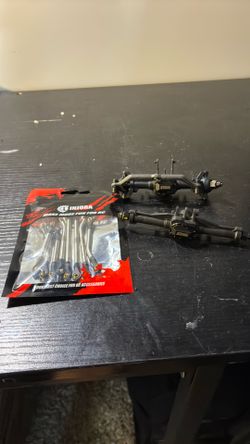 TRX-4m stock axels with upgrades with aluminum injora links in packaging