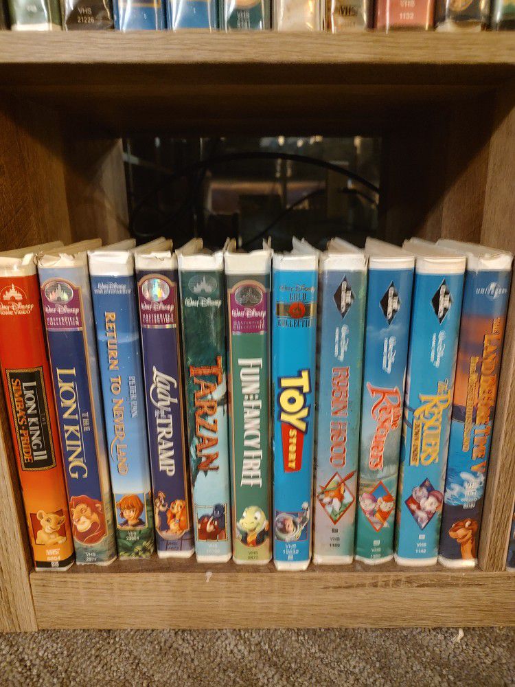 VCR AND 61 VHS Tapes