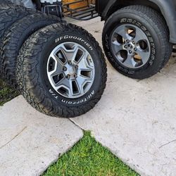 (5) OEM wheel from a Jeep Wrangler JK Rubicon