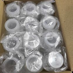 Empty plastic bag free bottles with lids