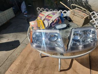 Head lights housing  for a 2004 grand jeep Cherokee special edition