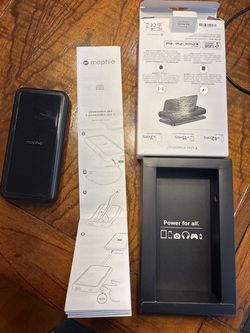 Mophie Powerstation Plus XL portable charger with built-in Lightning cable. Includes original box and booklet. Charging cable not included.