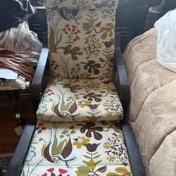 IKEA Poang Rocking Chair with Floral Pattern Cushion. 