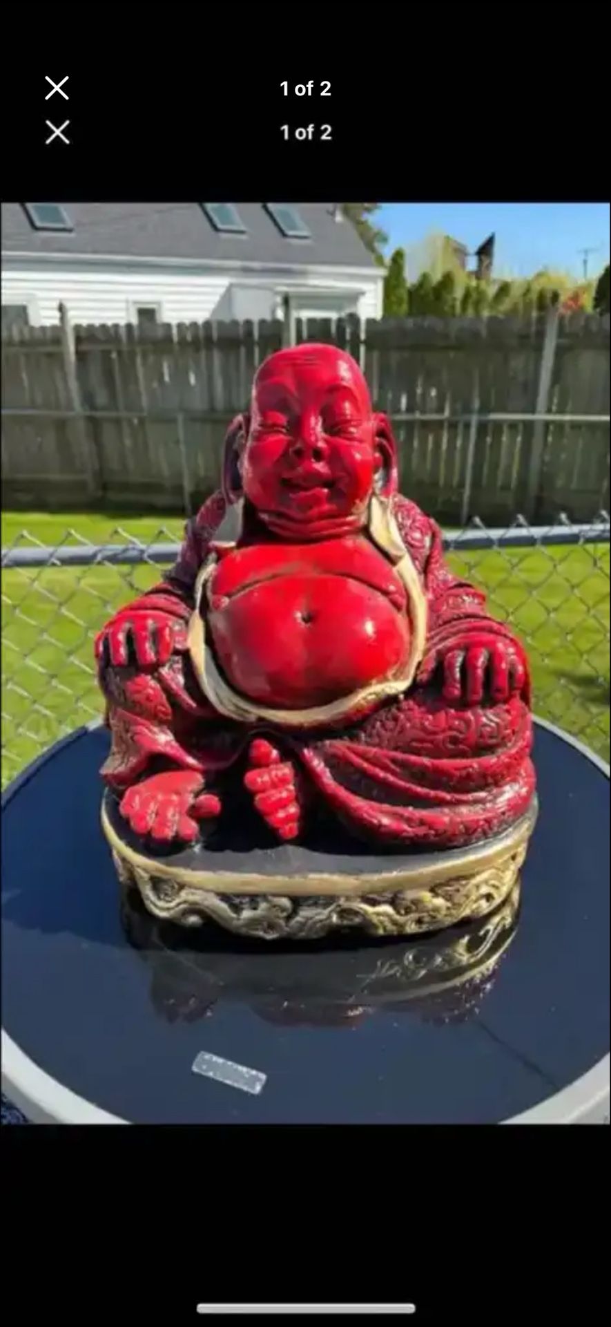 The big belly red Buddha statue